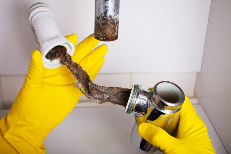 how to clear a clogged drain