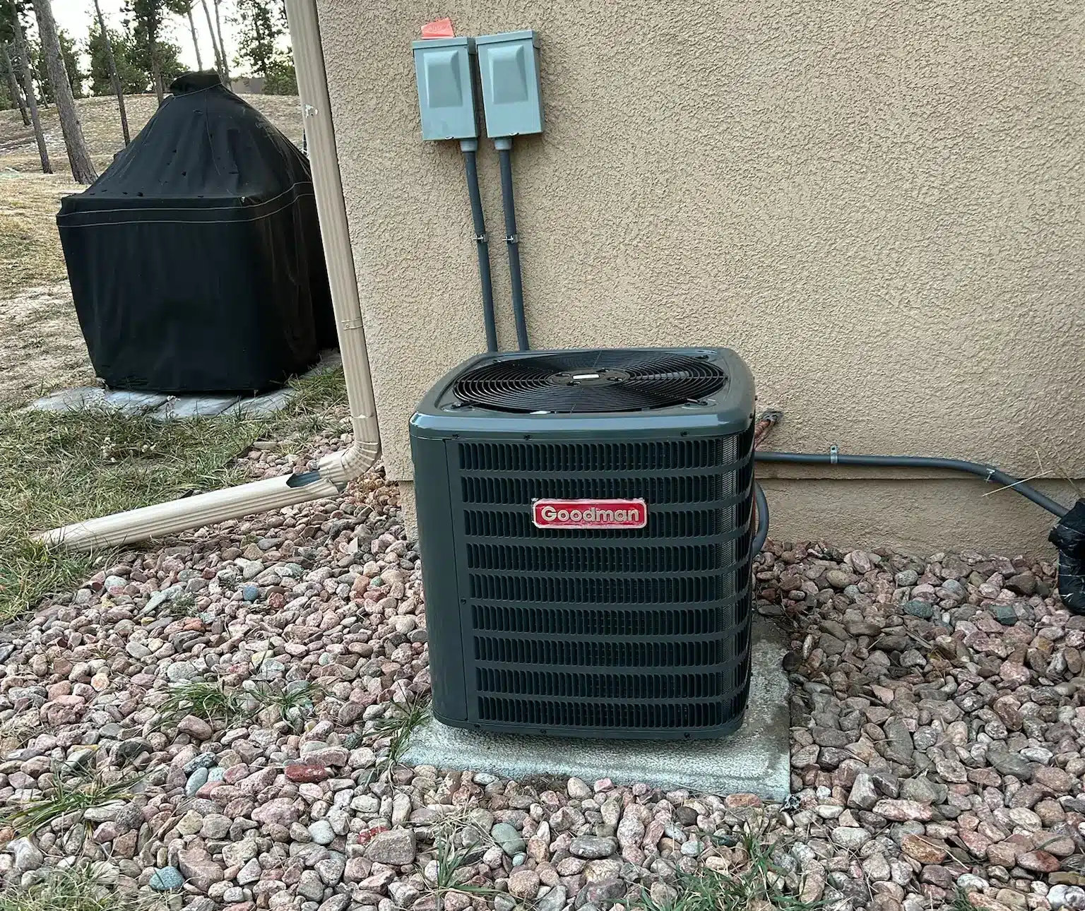 heat-pump-rebates-colorado-springs Heat pump rebates Colorado Springs qualifying Goodman outdoor unit installed at a Black Forest area home