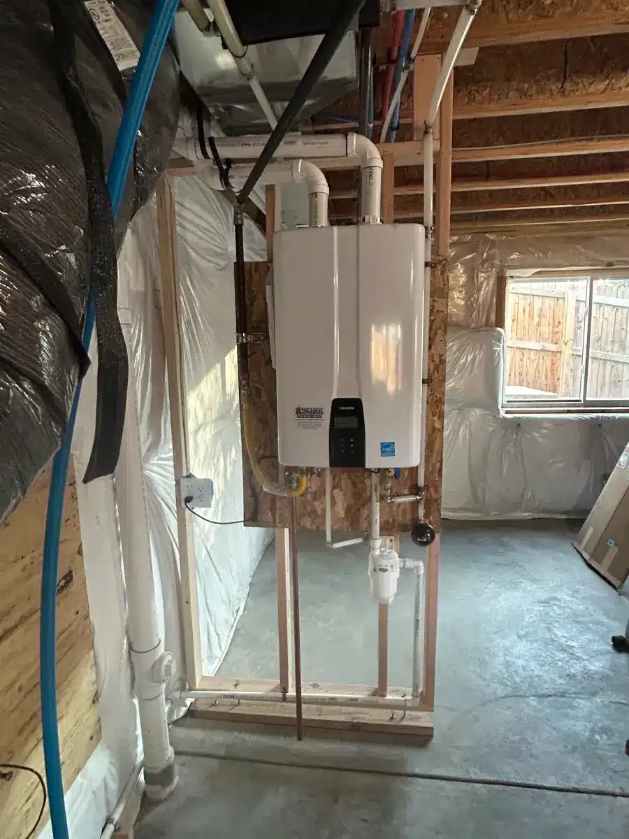 Tankless water heater cost in Colorado Springs reflected in this Navien installation gas connection